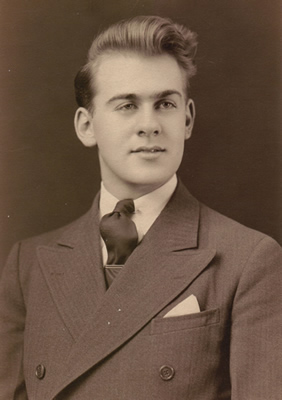 Sepia toned picture of a young and dapper Eddie Loomis